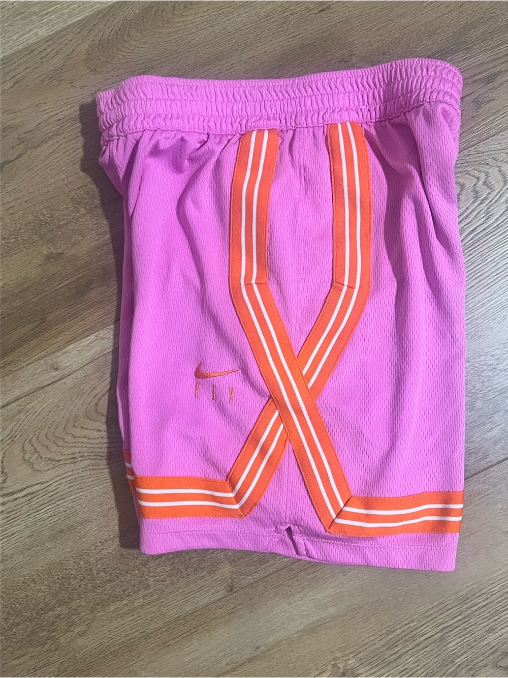 Nike Pink Running Shorts with Subtle Orange Swoosh